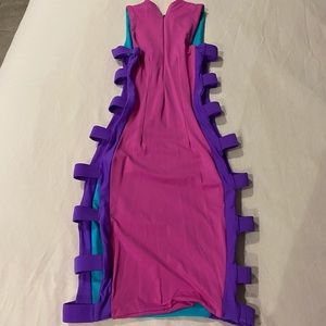 Miami vibe colors in this sexy open sides dress